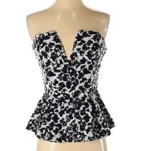 White and black strapless peplum top
